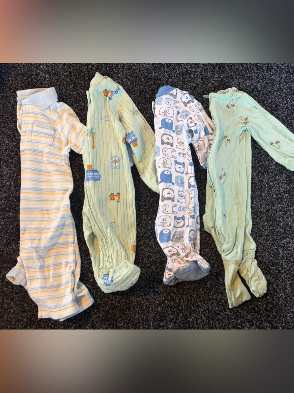 4 pieces of long sleeve onesies, two footed, one footless, one that can be eithe